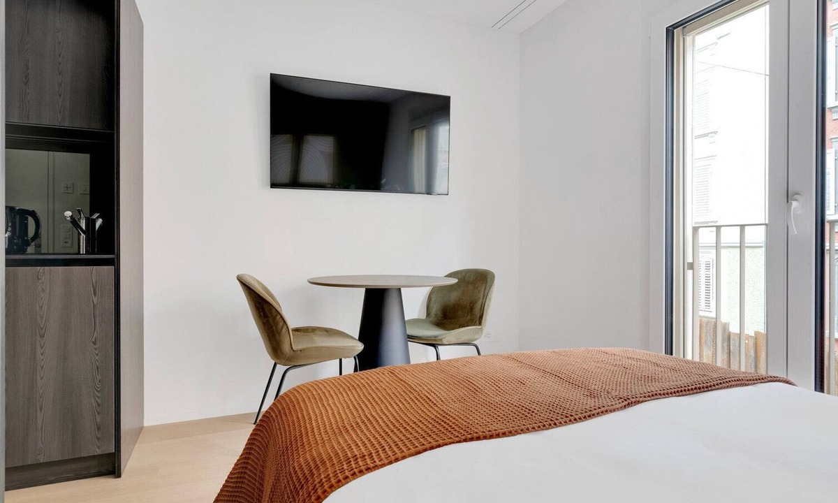 Sihlfeld Apartment | Airy Wiedikon 1.5 Room w/Storage & W/D, 1 min to Market, by Blueground
