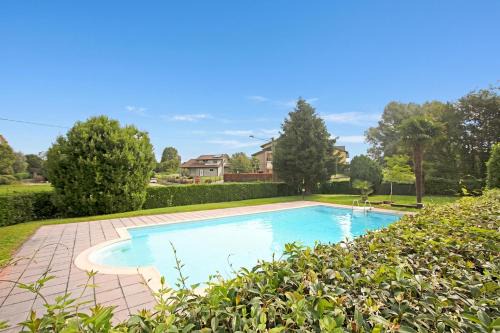 Angera Apartment | Angera Relax & Pool - Lake Maggiore Retreat - Happy Rentals
