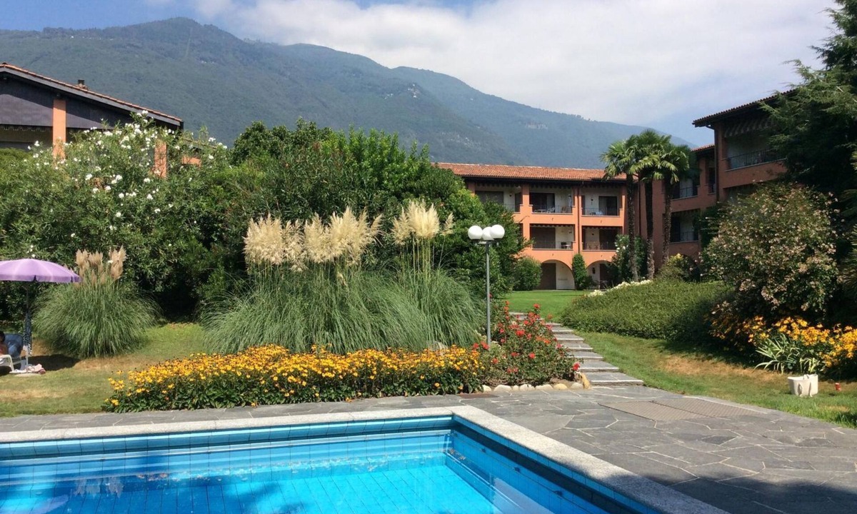 Ascona Apartment | Duplex apartment in a well-kept residence with outdoor pool and sunbathing area