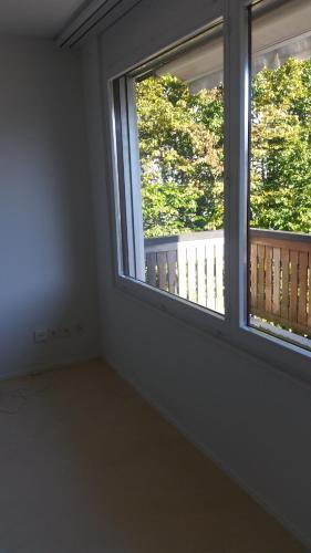 District 7 Apartment | Gästezimmer mit Gartenblick
