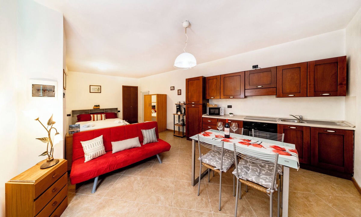 Visgnola Apartment | Located in the historic center of the hamlet of Visgnola, with a view of the patio.