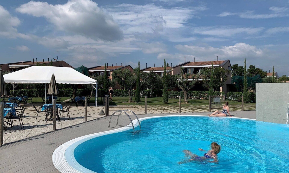 Moniga del Garda Apartment | Lovely apartment for 2 people with WIFI, pool, A/C, TV, balcony and pets allowed
