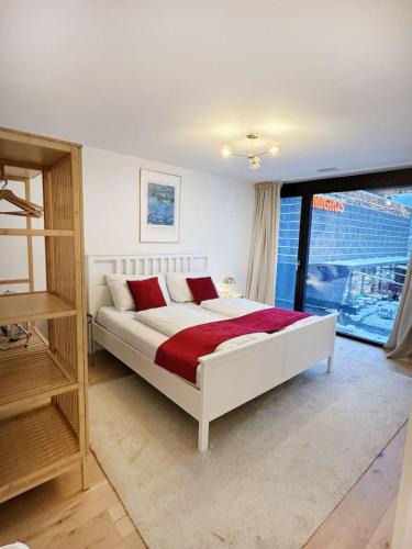 Central Interlaken Apartment | Modern Apartment with Balcony and BBQ at Interlaken West Station