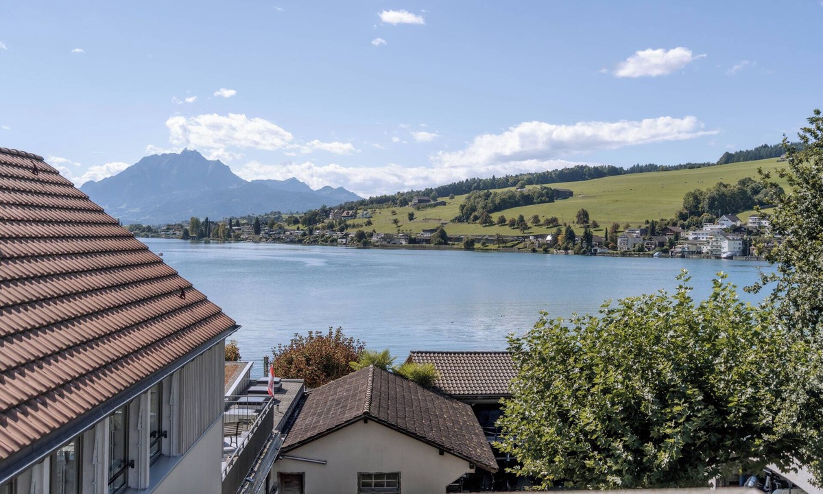 Kuessnacht Apartment | Soluna Stay | Lakefront Penthouse | Pilatus & Rigi view | Lucerne | Swiss Alps