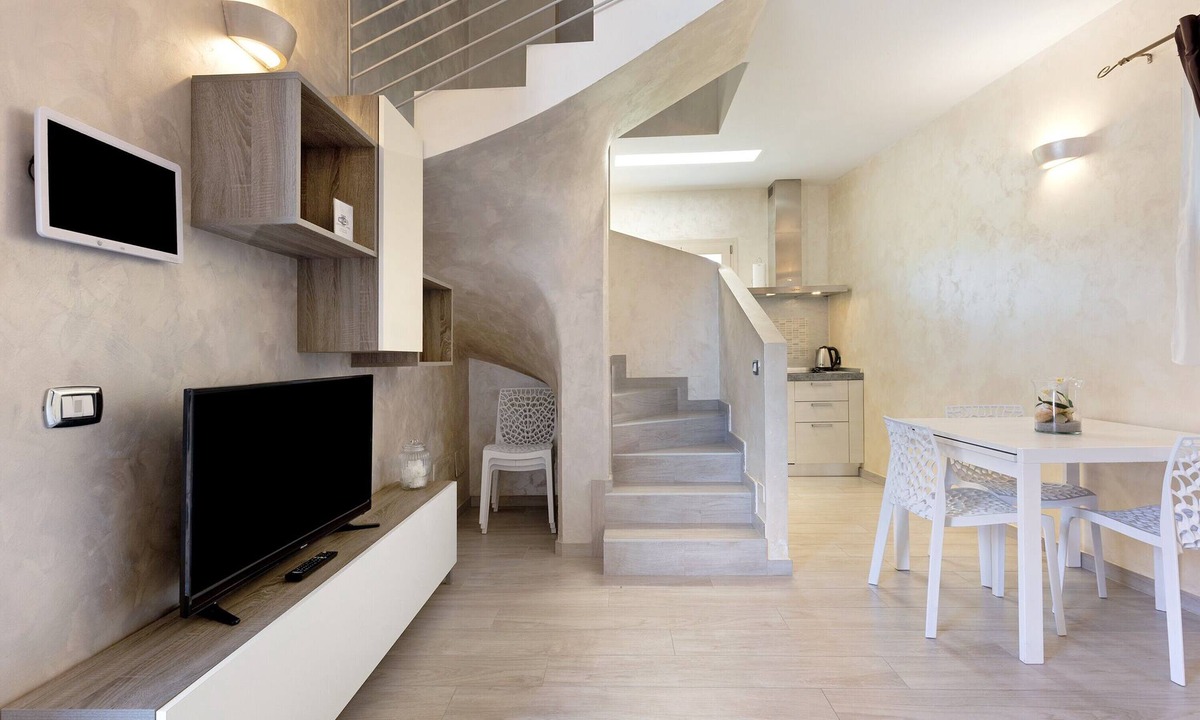 Lonato del Garda Apartment | The Magnolia Three-Room Apartment: Charm on Three Levels in Lonato del Garda’s Courtyard