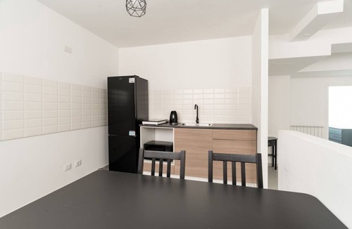 Giambellino Apartment | A cozy 60 sqm apartment that sleeps up to 4 people, located on the semi-basement level of a building (accessible via stairs).The neighborhood is well-connected to the city center and major attractions by public transport; the Tolstoj stop on the M4 met