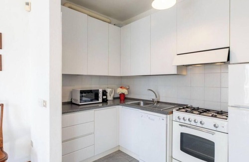 Bellano Apartment | Are you looking for a unique holiday home that offers a breathtaking view of Lake Como? Look no further than this gorgeous condo located right on the beach! With all the facilities needed for a comfortable stay, including air conditioning, wifi, indoor p