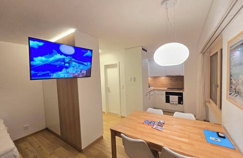 Lenzerheide Apartment | Belmont Seegarten vacation apartment directly on the Heidsee - only 3 minutes walk to the Talstati