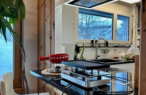 Engadin Scoul House | Bergwellness Chasa Stefania with panoramic view of the valley