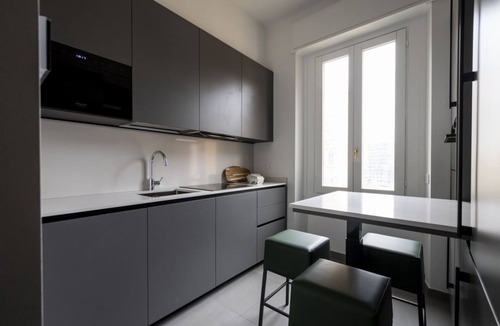 Loreto Apartment | Bright Top Floor Flat with Balconies & AC - Loreto & Porta Venezia