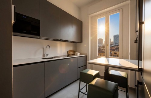 Loreto Apartment | Bright Top Floor Flat with Balconies & AC - Loreto & Porta Venezia