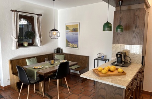Gordola Apartment | Charming vacation apartment with panoramic views, pool and garden paradise