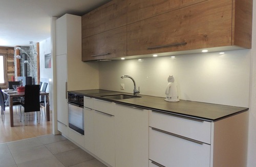 Grimentz Apartment | Comfortable 3 room apartment for 4-6 persons : Living room with Sofa-bed - swedish stove - kitchen w