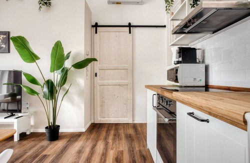 Mazzo Apartment | Courtyard House Rho Fiera Milano welcomes you to a warm and relaxing environment, perfect for a break after a busy day.Located just minutes from Fiera Milano Rho and well connected to the city center, it offers well-kept and functional spaces, an equippe