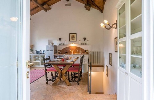 Villa Guardia Apartment | GuestHost - Confortable and stylish 90smq duplex apt that can accomodate up to 4 people located in a period building without a lift.Portion of private garden, large garden with shared pool and private parking space.Inside the building there is a historic
