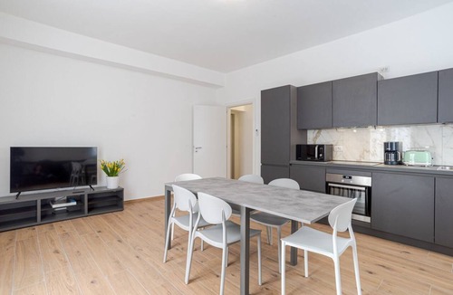 Cesana Brianza Apartment | GuestHost - Travel with your family and friends and explore lakes and mountains near Como!This spacious apartment, with two bedrooms, two bathrooms, open space kitchen with island, large living room, small terrace, is located on the road that connects th