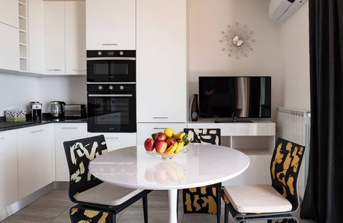 Plassi Apartment | Lights on the Lake one-bedroom apartment with rooftop terrace and lake view pool