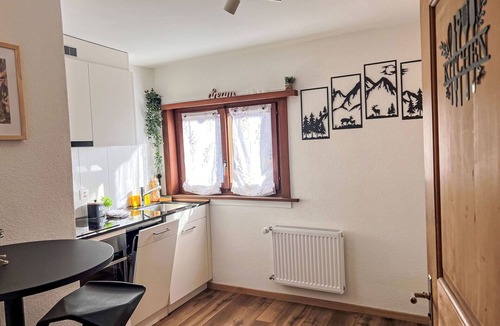 Klosters Platz Apartment | Lovely apartment for 4 guests with WIFI, TV, balcony and pets allowed