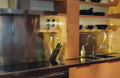 Naggio Apartment | Luxury lakefront apartment with terrace and swimming pool.
