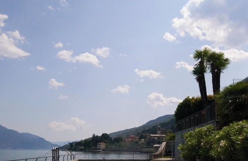 Naggio Apartment | Luxury lakefront apartment with terrace and swimming pool.