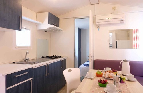 Gralaoni-Pralesi-Cisano House | Mobile home with air conditioning, terrace, and pool