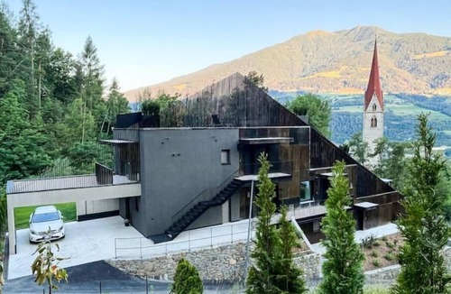 Sant'Andrea in Monte Apartment | modern, luxury, private entrance, garden, terrace, and stunning mountain views.