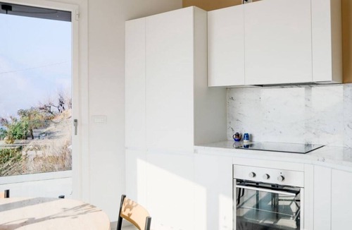 Bellano Apartment | Nestled in a serene oasis, this apartment offers the perfect place to relax and recharge. With its spacious and beautiful interior, you will be captivated by the splendid views of Lake Como that greet you at every corner. This hidden jewel is equipped wi