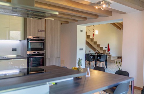 Cino Apartment | Orizzonte Verde - Modern Suite with garden, hot tub and Valtellina views