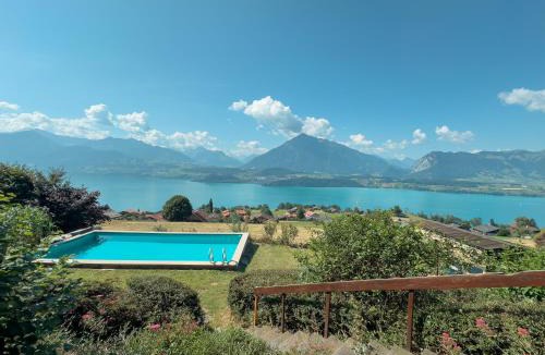 Aeschlen ob Gunten Ski Chalet | Private Chalet with Pool, Lake & Mountain Views