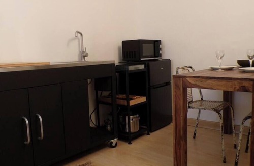Cerro Apartment | Romantic Attic Retreat with Panoramic Terrace, Steps from the Lake