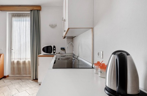 Coredo Apartment | Room 'Vento Alpino Albero' with Mountain View, Balcony and Wi-Fi