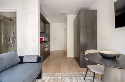 Sihlfeld Apartment | Roomy Wiedikon 1.5 Room w/Storage & W/D, 1 min to Market, by Blueground