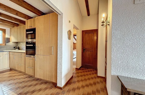 Verbier Apartment | Spacious living room with fireplace, fully equipped kitchen (Nespresso coffee machine, microwave, di