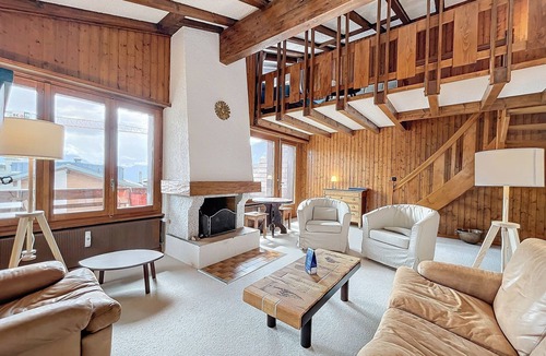 Verbier Apartment | Spacious living room with fireplace, fully equipped kitchen (Nespresso coffee machine, microwave, di