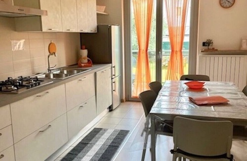 Riva del Garda Apartment | "Verde House 1" Apartment with Mountain Views, Balconies, Shared Garden, and Wi-Fi