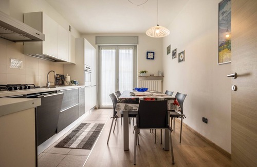 Riva del Garda Apartment | "Verde House 2" Apartment with Mountain Views, Balconies, Shared Garden, and Wi-Fi
