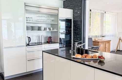 Ruetli House | Villa am See 5/Beach House by Interhome