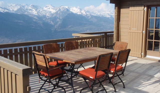 Escape the heat in a stunning mountain chalet with jaw-dropping views.