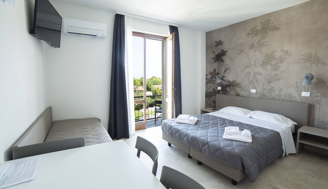 Junior Suite 2 with Shared Pool & Balcony