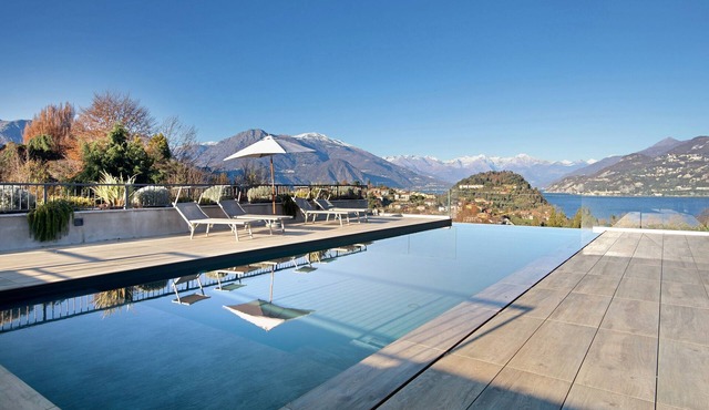 Lake Como Retreat Apartment with Private Parking, Shared Pool, and Air Conditioning