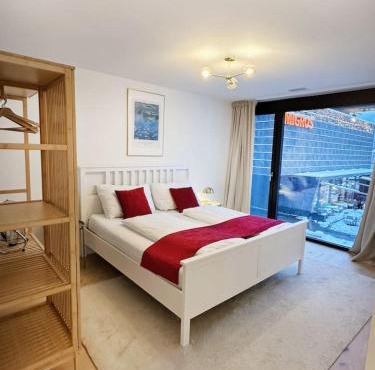 Modern Apartment with Balcony and BBQ at Interlaken West Station