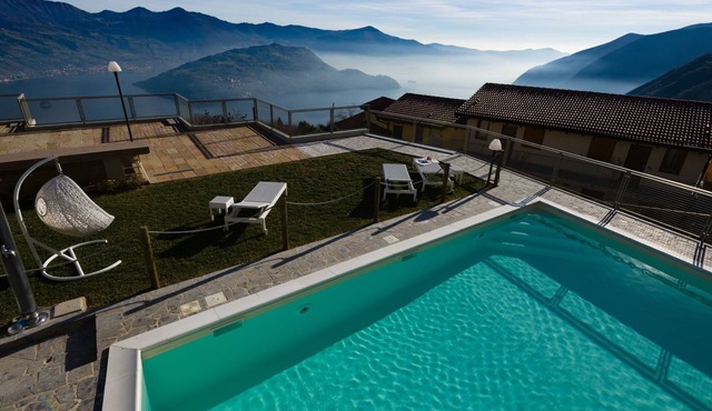 Terrazza a Lago - Dreizimmerwohnung mit Terrasse und Schwimmbad by Interhome