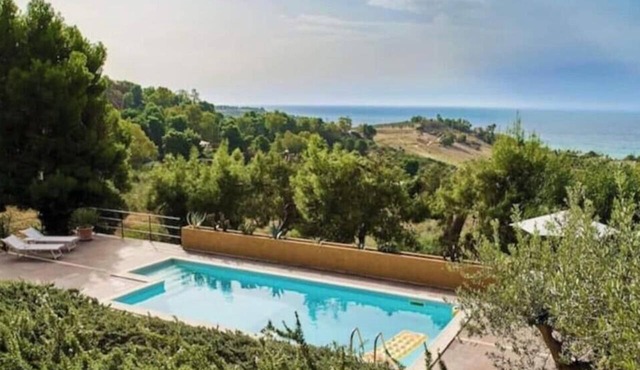 Villa Carruba—A Beachfront Gem with a Pool in Sciacca