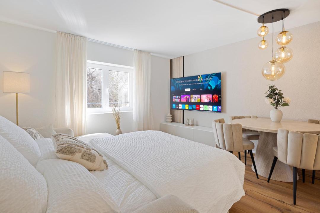 Glattbrugg Apartment | HAVN - Urban Riverside Apartment with cinema, airport and free parking