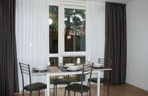 Bissone Apartment | Charming Gardenview App. 105 by Interhome
