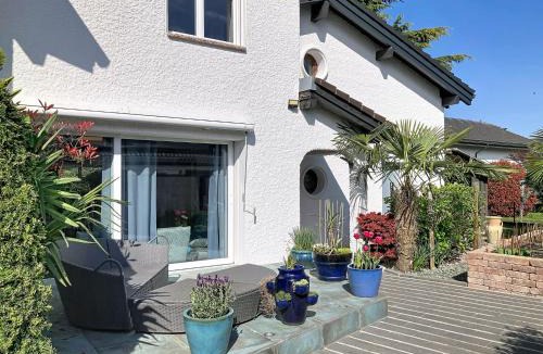 Bouveret House | Holiday Home La Maison des Palmiers by Interhome