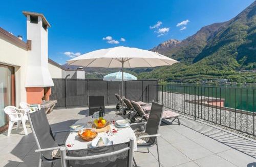 Riva San Vitale Apartment | Casa Bader - Lake View Apt with Pool & Sauna - Happy Rentals