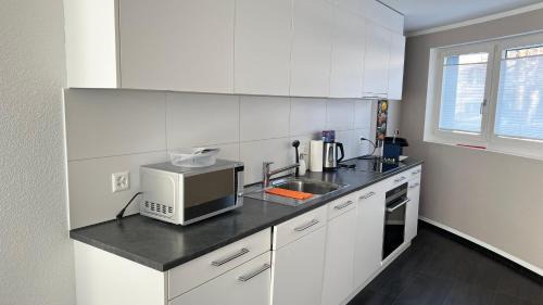 Stans Apartment | Modern apartment Pilatus view self check-in