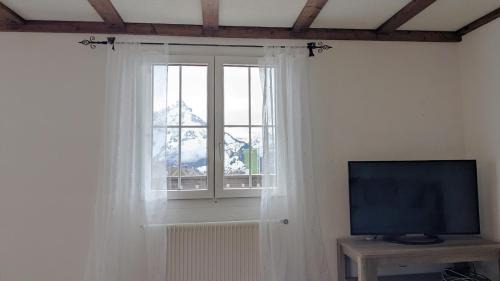 Mitloedi Apartment | Ferienwohnung im Hotel Arvenbüel