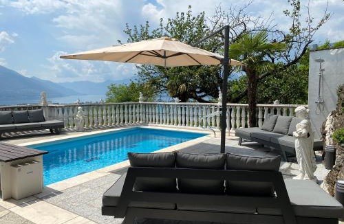 Gordola Villa | Ferienhaus Patrizia with a fantastic view of Lake Maggiore and the pool